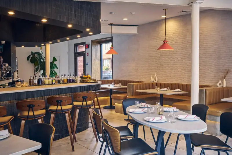 The warm dining room and bar at Five Corners Ristorante in Newark's Ironbound
